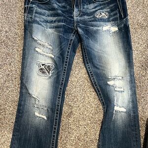 Distressed Blue Jeans